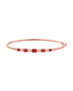 0.99CT RUBY AND ROUND DIAMOND BEZEL SET BANGLE
