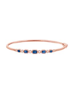 0.84CT SAPPHIRE AND ROUND DIAMOND BEZEL SET BANGLE