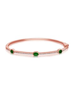 1.04CT EMERALD AND ROUND DIAMOND BEZEL SET BANGLE