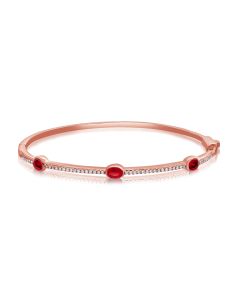 1.04CT RUBY AND ROUND DIAMOND BEZEL SET BANGLE