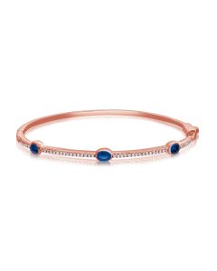 1.04CT SAPPHIRE AND ROUND DIAMOND BEZEL SET BANGLE