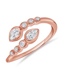 0.40CT PEAR SHAPE AND ROUND DIAMOND BEZEL RING