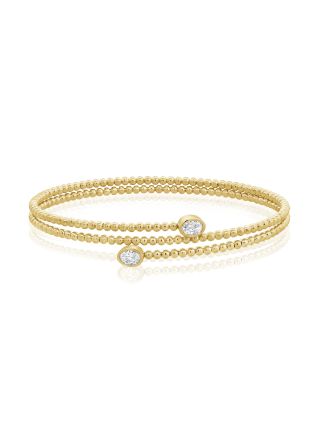 0.40CT OVAL SHAPE DIAMOND BEZEL SET BALL CUFF BANGLE