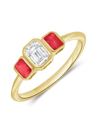 0.86CT RUBY AND EMERALD SHAPE DIAMOND BEZEL SET THREE STONE RING